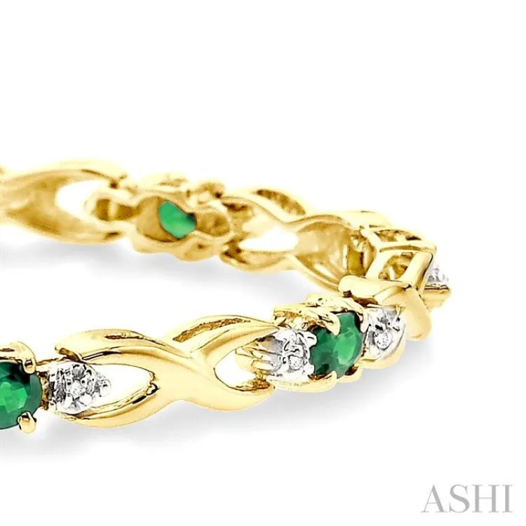 4x3 MM Oval Cut Emerald and 1/10 Ctw Single Cut Diamond Bracelet in 14K Yellow Gold