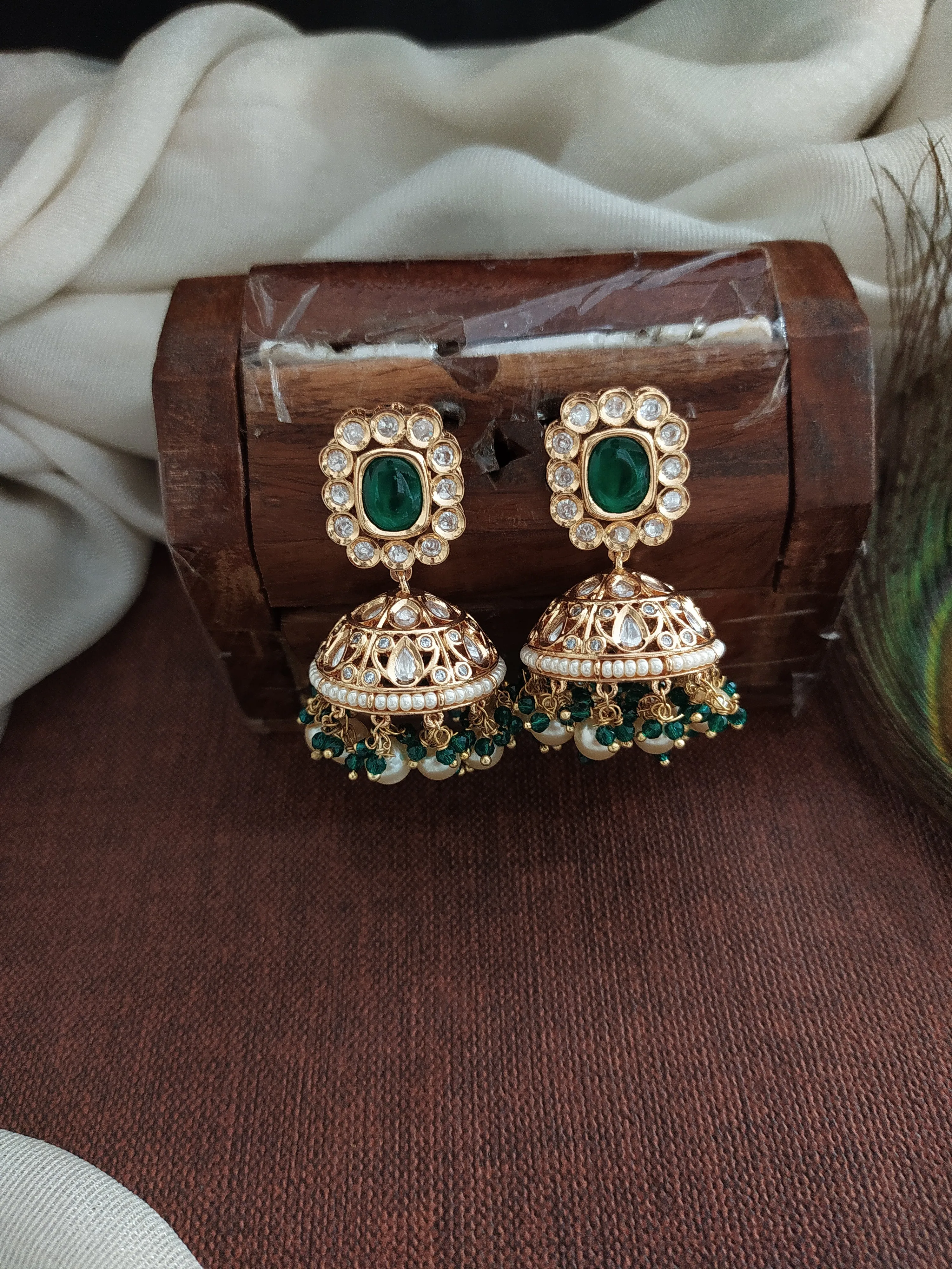 Elegant Kundan Jhumki in Green and Mint with White Stones