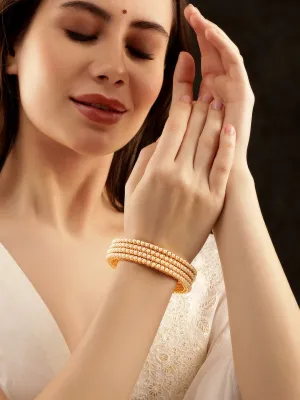 Rubans Set of 4, 22K Gold plated Pearl Studded Classic Bangles